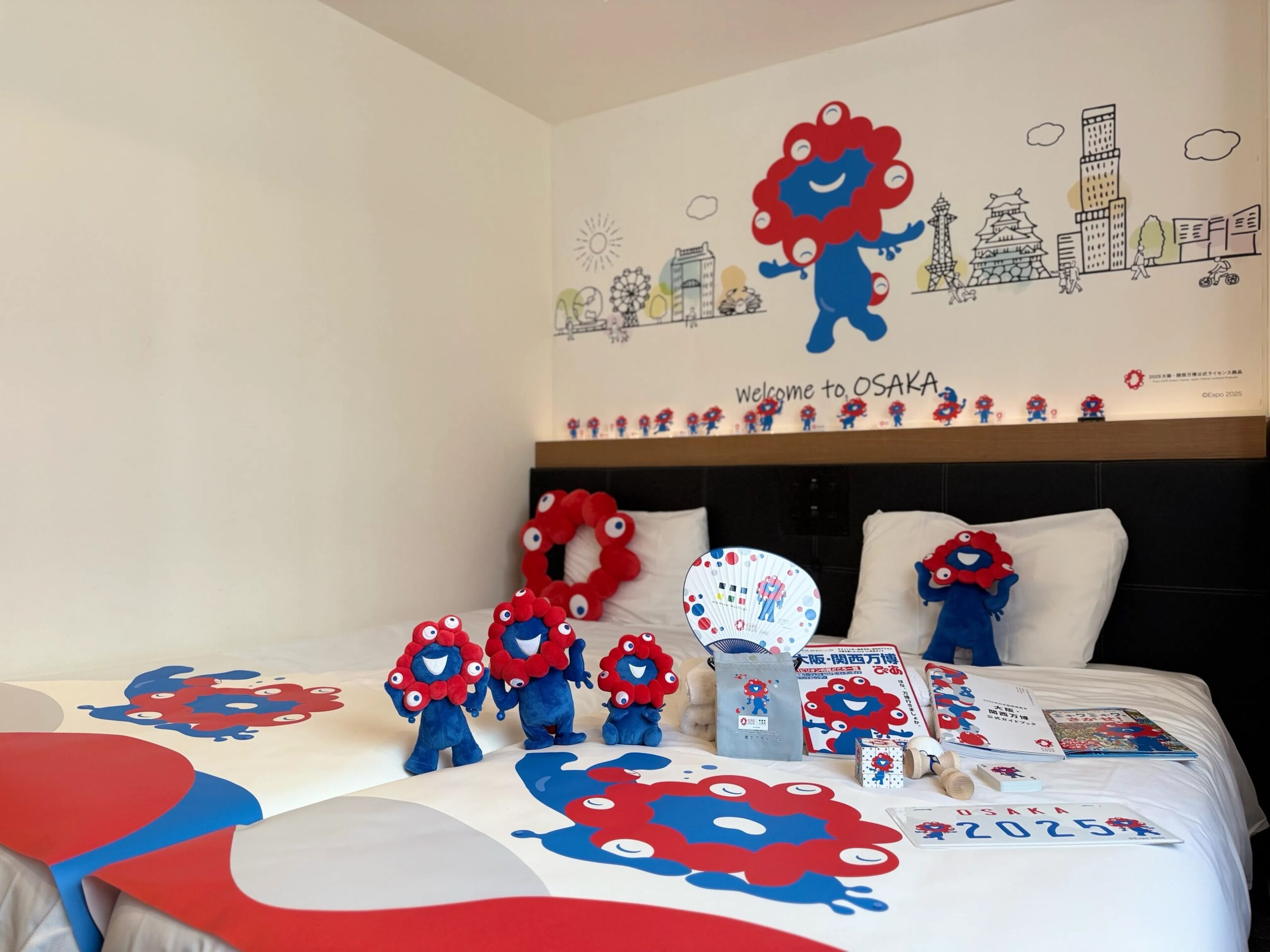 Henn na Hotel Group collaborates with the official character of the Osaka-Kansai Expo, 'Myakumyaku'. 'Myakumyaku Collaboration Room' plan available with Expo tickets and original goods.